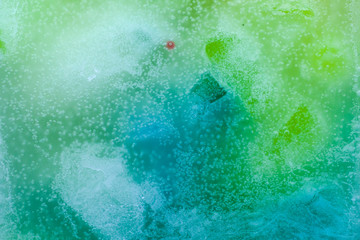 Colorful background, candle macro, air bubbles and wax, texture and wallpaper. Mixed and...