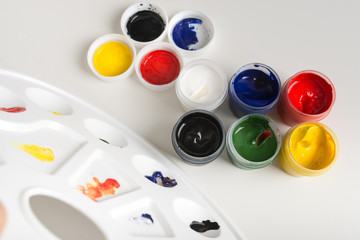 The palette of paint on a white background