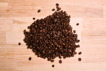 coffee beans on wooden background