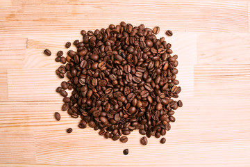 coffee beans on wooden background
