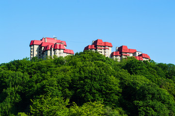 new house on a hill in a clear cloudless day