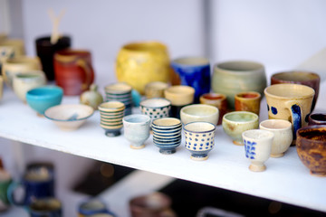 Ceramic dishes, tableware and jugs sold on Easter market in Vilnius. Lithuanian capital's traditional crafts fair is held every March on Old Town streets.