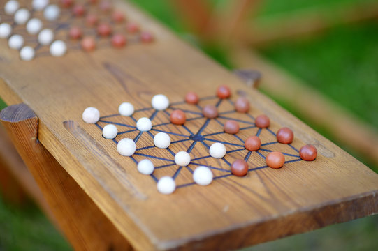 Alquerque, medieval strategy board game, originated in the Middle East.