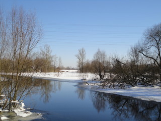 Fototapeta na wymiar winter landscape snow river tree