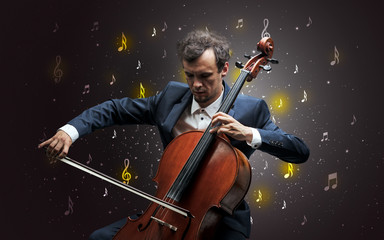 Fototapeta premium Young cellist with falling musical notes wallpaper and classical concept