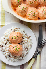 Chicken meatballs in creamy tomato sauce with rice