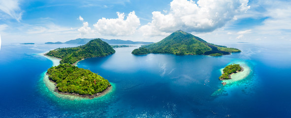 Aerial view Banda Islands Moluccas archipelago Indonesia, Pulau Gunung Api, lava flows, coral reef...