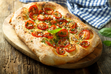 Tomato focaccia with fresh basil
