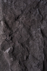Black stone rustic wall. Dark gray texture close up high quality. May be used blank for design.