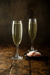 Champagne served with pink biscuits