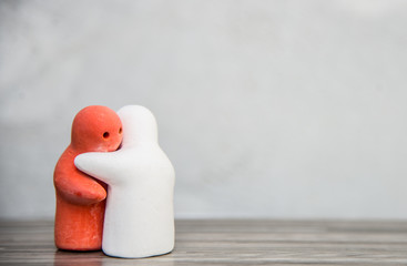 Hugging on blur background.