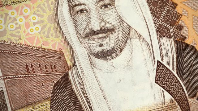 Saudi Arabia King Salman on 10 riyal (2016) banknote rotating, Saudi Arabian money close up. 4K UHD video footage