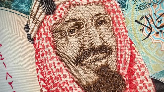 Saudi Arabia King Saud Bin Abdulaziz on 20 riyals banknote rotating, Saudi arabian money close up. 4K UHD video footage