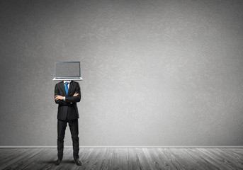 Businessman with laptop instead of head.