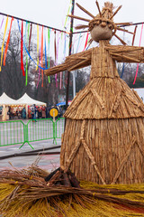 Straw effigy Maslenitsa on the traditional holiday dedicated to the approach of spring - Slavic celebration Shrovetide