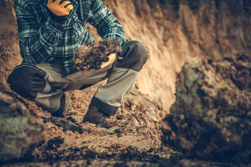 Foto op Canvas Geologist Checking the Soil © Tomasz Zajda