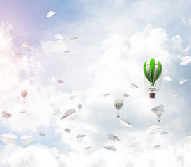 Flying hot air balloons in the air.