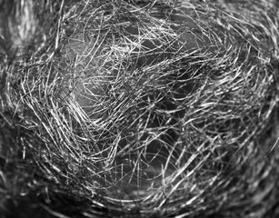 Black web on white background. Intertwined threads. The texture of the web. Gloomy background. Strange abstraction. Cosmic illusion. Intricate pattern.