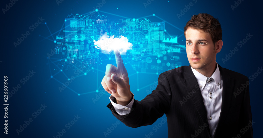Aufkleber Man touching hologram projection displaying information from cloud based system
