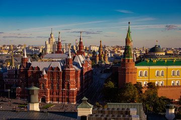 Fototapeta premium Evening sunset in a Panoramic view of the Red Square with Moscow Kremlin and St Basil's Cathedral in the twilight sky, Moscow, Russia