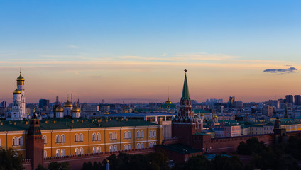 Beautiful view on the rooftop with Moscow Kremlin, Kremlin Embankment and Moscow River at night in Moscow, Russia. Architecture and landmark of Moscow