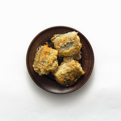 Delicious fried fish on white background, top view, flat lay