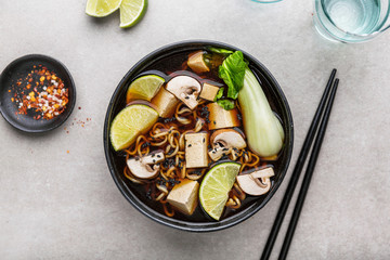 Tofu asian vegetarian soup served in bowl
