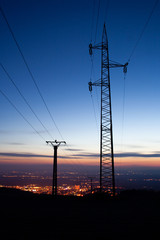 Fototapeta premium High voltage tower at sunset