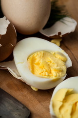 Baked eggs on wooden background