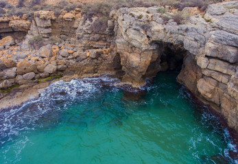 Aerial view of the cave in the rocky coast