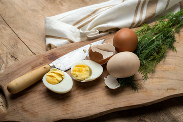 Baked eggs on wooden background