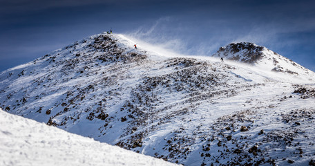 Fototapeta na wymiar Mountain in Colorado with Snow and Skiers