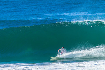 Surfer Surfing Wave Bottom Turn Action