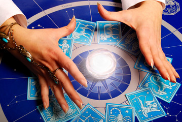 Fortune teller astrologer with astrology esoteric tools