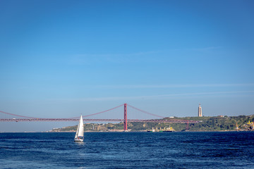 A boat sailing in the Tejo river in Lisbon in Portugal