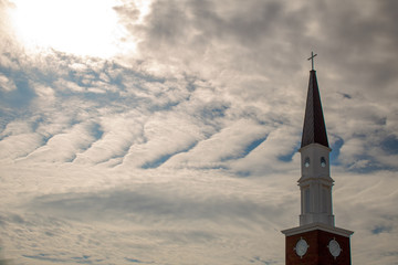 Church Steeple With Cloudy Sky