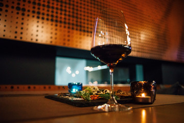 glass of wine on table in restaurant