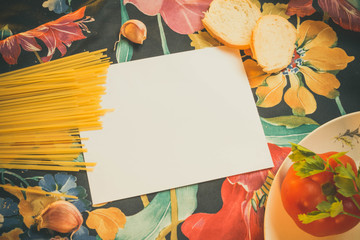 Italian food on the table to be cooked. Fresh pasta on the plate.