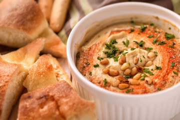 Hummus with pine nuts