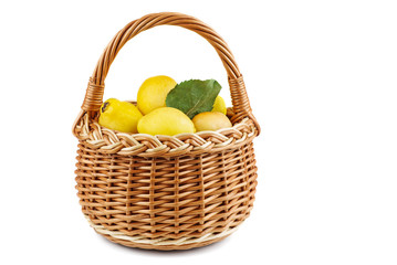 Maules quince (Chaenomeles japonica) in wicker basket isolated on white background