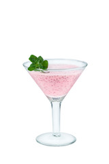 Glass of homemade strawberry yogurt with cia seeds and mint