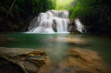 Huay mae khamin waterfall, this cascade is emerald green and popular in Kanchanaburi province, Thailand.