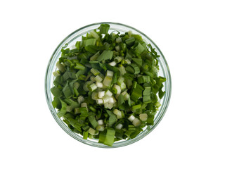 Chopped leaves of wild garlic in a bow top view
