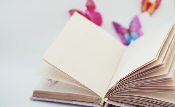 A diary for entries on a white table