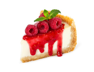 Piece of cheesecake with raspberries and mint isolated on white