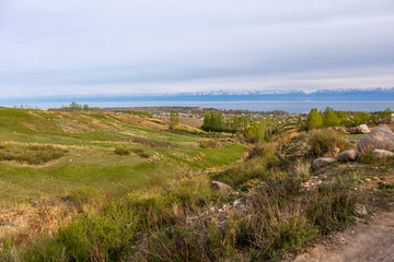 Fototapeta na wymiar Beautiful landscape, Issyk-Kul lake, Bosteri, Kyrgyzstan