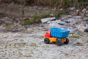 Playing with toy truck