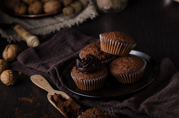Homemade chocolate muffins with chocolate topping
