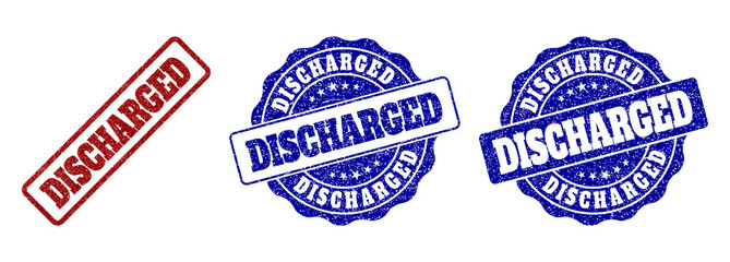 DISCHARGED scratched stamp seals in red and blue colors. Vector DISCHARGED watermarks with distress texture. Graphic elements are rounded rectangles, rosettes, circles and text titles.