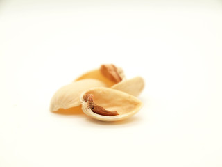 Pistachios fruit and shell on qhite background